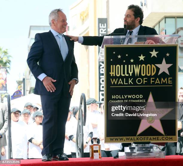 Chef Wolfgang Puck and director Brett Ratner attend Wolfgang Puck being honored with a Star on the Hollywood Walk of Fame on April 26, 2017 in...