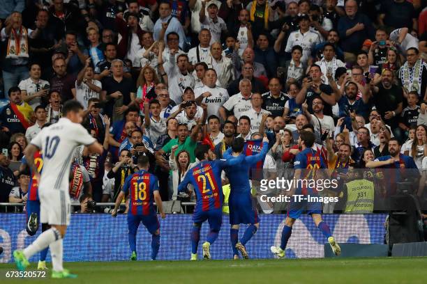 Lionel Messi of FC Barcelona celebrates after scoring his team goal during the La Liga match between Real Madrid CF and FC Barcelona at the Santiago...