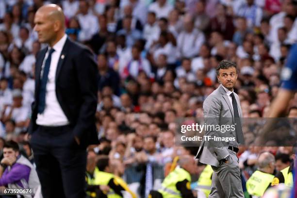 Zinedine Zidane of Real Madrid and Luis Enrique of FC Barcelona looks on during the La Liga match between Real Madrid CF and FC Barcelona at the...