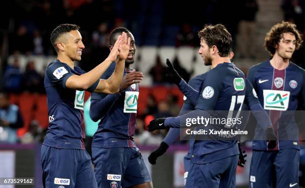 Marquinhos of Paris Saint-Germain celebrates his goal with Maxwell during the French Cup Semi-Final match between Paris Saint-Germain and As Monaco...