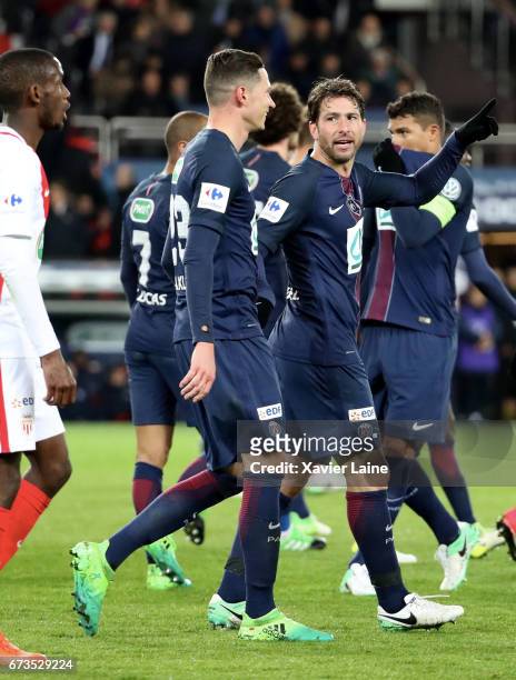 Marquinhos of Paris Saint-Germain celebrate his goal with Julian Draxler and Maxwell during the French Cup Semi-Final match between Paris...
