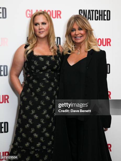 Amy Schumer and Goldie Hawn attend a special screening of "Snatched" at The Soho Hotel on April 26, 2017 in London, England.