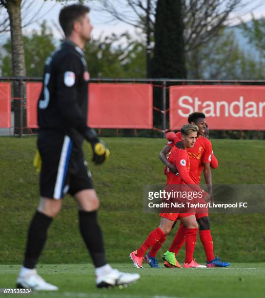 Yan Dhanda of Liverpool celebrates his second goal with teammate Kane Lewis during the Liverpool v Rochdale Lancashire Senior Cup Semi-Final at The...