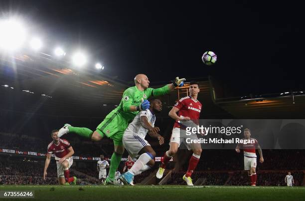 Brad Guzan and Daniel Ayala of Middlesbrough and Victor Anichebe of Sunderland clash during the Premier League match between Middlesbrough and...