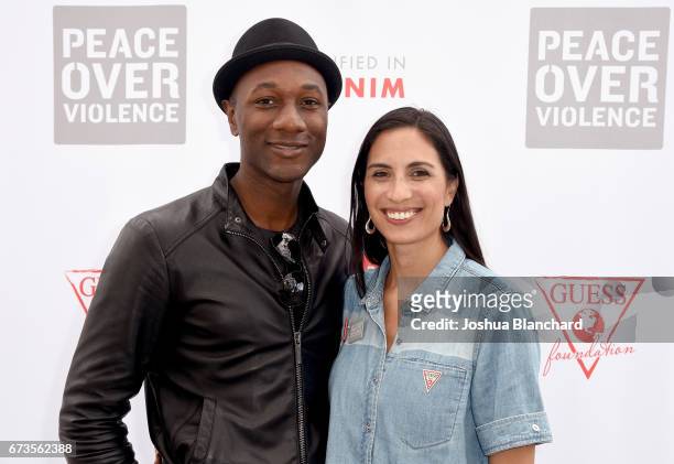 Singer/songwriter Aloe Blacc and rapper Maya Jupiter attend the GUESS x Peace Over Violence support Denim Day event at Third Street Promenade on...