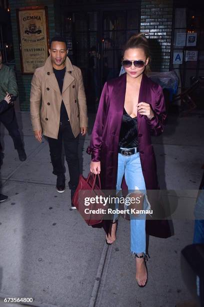 John Legend and Chrissy Teigen seen at Gemma Restaurant on April 26, 2017 in New York City.