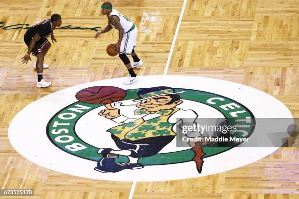 Isaiah Canaan of the Chicago Bulls defends Isaiah Thomas of the Boston Celtics during the first quarter of Game Five of the Eastern Conference...