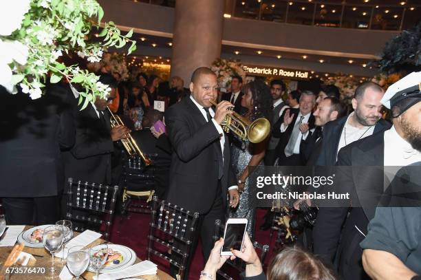 Trumpeter Wynton Marsalis leads a second line parade during at the Jazz at Lincoln Center 2017 Gala "Ella at 100: Forever the First Lady of Song" on...