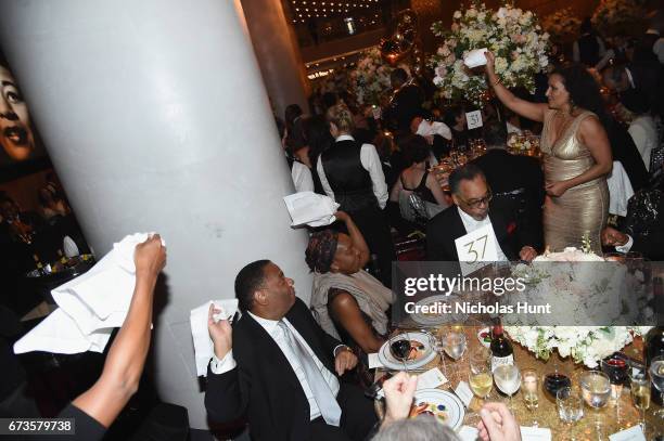 Guests dance as a second line parade marches through dinner at the Jazz at Lincoln Center 2017 Gala "Ella at 100: Forever the First Lady of Song" on...