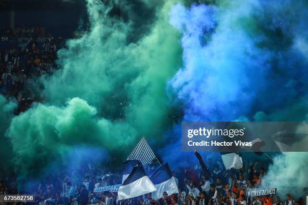 Fans of Pachuca light smoke flares to cheer for their team during the Final second leg match between Pachuca and Tigres UANL as part of the CONCACAF...