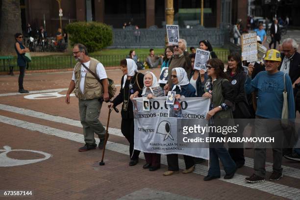 Members of the Argentine human rights group "Madres de Plaza de Mayo" Taty Almeida , Nora Cortinas and Mirta Acuna de Baravalle take part in the...