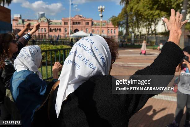 Members of the Argentine human rights group "Madres de Plaza de Mayo" Taty Almeida and Mirta Acuna de Baravalle take part in the weekly march at the...