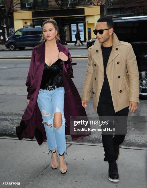 Chrissy Teigen and John Legend are seen walking in Soho on April 26, 2017 in New York City.
