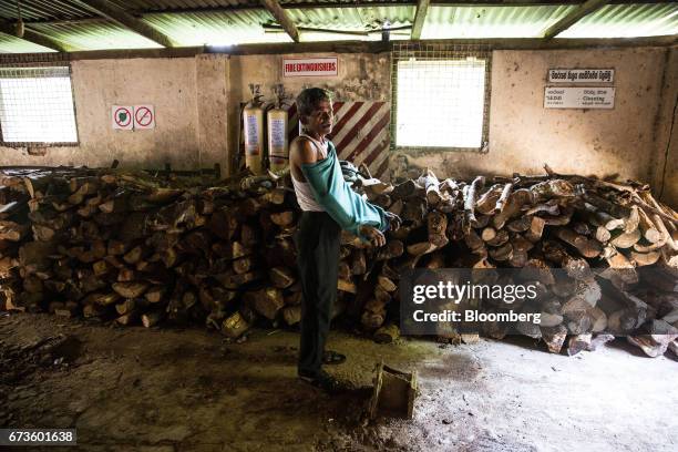 Mechanic changes before work at the factory of the Geragama Tea Estate, operated by Pussellawa Plantations Ltd., in Pilimathalawa, Central, Sri...