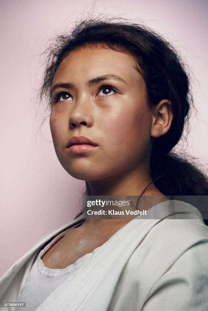 Portrait of cool young female martial arts athlete