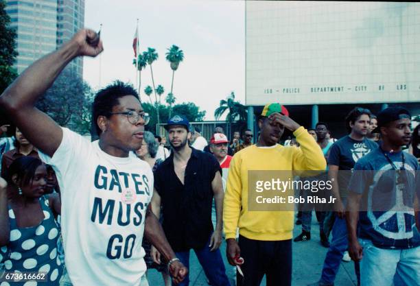 Outside the Los Angeles Police Department Headquarters at Parker Center , demonstrators protest in the wake of the verdict in the Rodney King case...