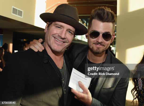 Singers/Songwriters Jerrod Niemann and Chase Bryan attend 2017 CMA Music Teachers Of Excellence Dinner at Nissan Stadium on April 26, 2017 in...