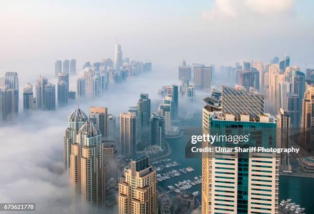 fog in dubai - dubai fog stock pictures, royalty-free photos & images