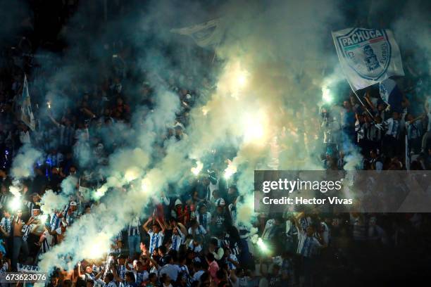 Fans of Pachuca light flares to celebrate after winning the Final second leg match between Pachuca and Tigres UANL as part of the CONCACAF Champions...