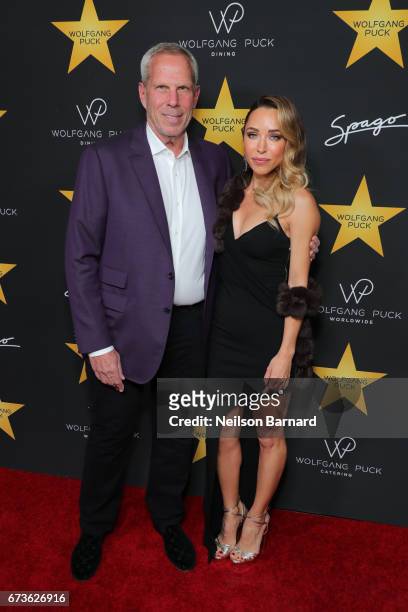 Steve Tisch and Katia Francesconi attend the celebratory party in honor of Wolfgang Puck receiving a star on The Hollywood Walk Of Fame hosted by...