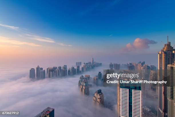 fog in dubai - dubai fog stock pictures, royalty-free photos & images