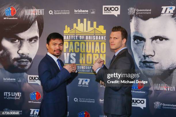 Boxers Manny Pacquiao of the Philippines and Jeff Horn of Australia pose for the media during a press conference at Invictus Gym on April 27, 2017 in...