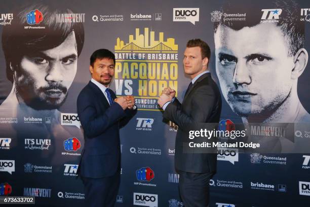 Boxers Manny Pacquiao of the Philippines and Jeff Horn of Australia pose for the media during a press conference at Invictus Gym on April 27, 2017 in...