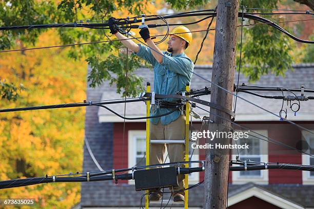 Electric Lineman On Pole Photos and Premium High Res Pictures - Getty ...