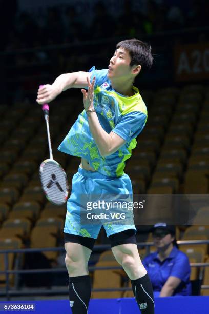 Son Wan-ho of South Korea returns to Tanongsak Saensomboonsuk of Thailand during 2017 Badminton Asia Championships men's singles second round match...