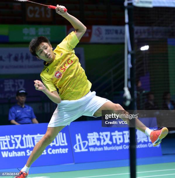 Tanongsak Saensomboonsuk of Thailand returns to Son Wan-ho of South Korea during 2017 Badminton Asia Championships men's singles second round match...