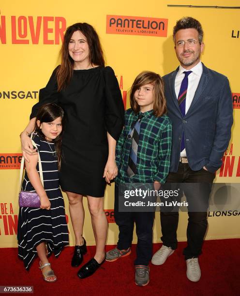 Actress Kathryn Hahn and actor Ethan Sandler and children attend the premiere of "How to Be a Latin Lover" at ArcLight Cinemas Cinerama Dome on April...