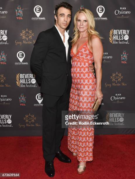 Actor Sam Upton and wife Tracy Effinger attend "GUN" showing at the 17th Annual Beverly Hills Film Festival Opening Night at TCL Chinese 6 Theatres...