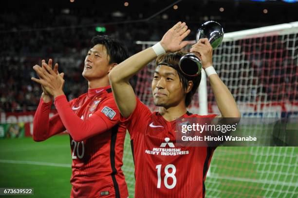 Yoshiaki Komai of Urawa Red Diamonds and Tadanari Lee of Urawa Red Diamonds look on after lthe AFC Champions League Group F match between Urawa Red...