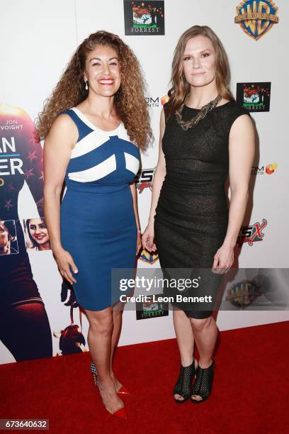 Olympians Afsoon Roshanzamir Johnston and Sally Roberts attends the Premiere Of Warner Bros. Home Entertainment's "American Wrestler: The Wizard" at...
