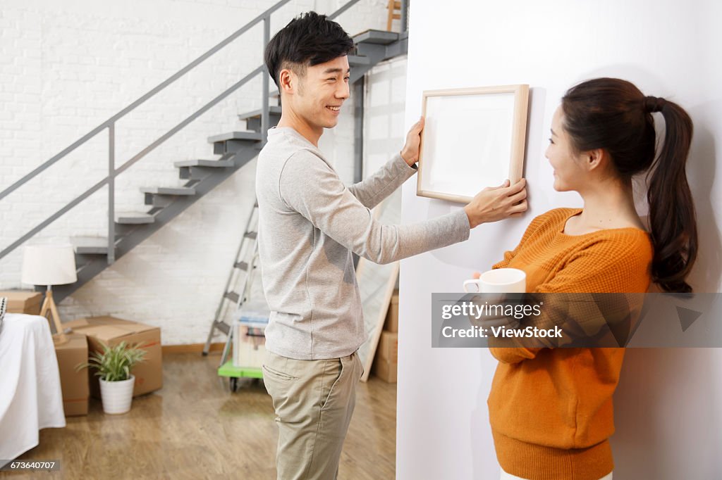 Young couple happy home improvement