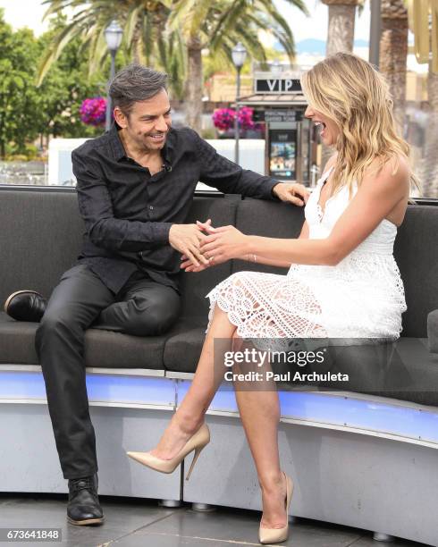 Actor Eugenio Derbez talks to TV Host Charissa Thompson on the set of "Extra" at Universal Studios Hollywood on April 26, 2017 in Universal City,...