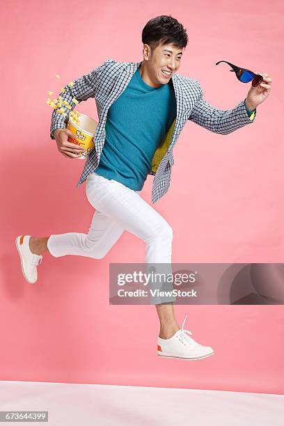 excited young man - man running food stock pictures, royalty-free photos & images