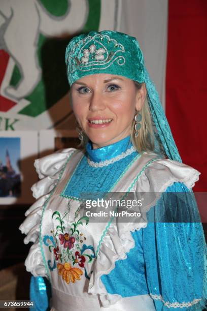 Tartar woman wearing the traditional dress of Tatarstan during Nevruz celebrations in Toronto, Canada. Nevruz which means 'new day' marks the first...