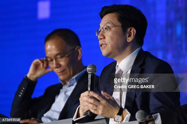 Kai-Fu Lee , Chairman and CEO of Sinovation Ventures, speaks at the Global Mobile Internet Conference in Beijing on April 27, 2017. / AFP PHOTO /...