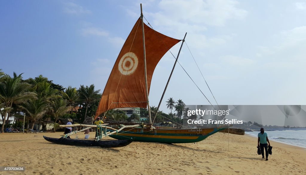 Traditional outrigger fishing boat (oruva), Negombo Beach, Sri Lanka.