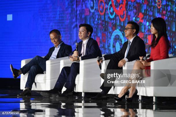 Chairman and CEO of Sinovation Ventures Kai-Fu Lee speaks as the former CEO of Kingsoft Zhang Hongjiang , Chairman of GMIC and President of Baidu...