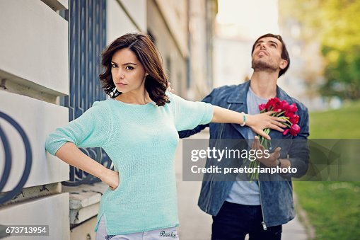 Young is girl is rejecting boy on the street Young is girl is rejecting boy on the street