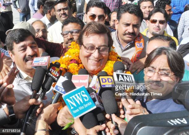 Bollywood actor and and BJP Lok Sabha Candidate from Gurdaspur Vinod Khanna along with his wife Kavita Khanna at Golden Temple, on March 26, 2014 in...