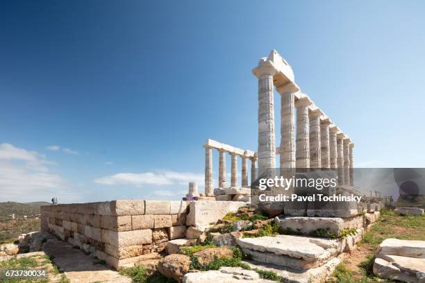 remains of the temple of poseidon on cape suonion, greece - greek culture foto e immagini stock