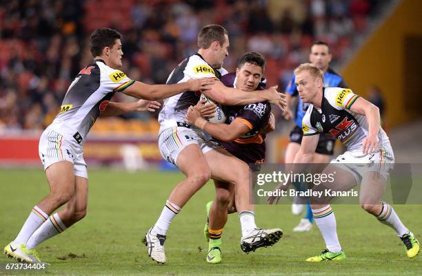 Kodi Nikorima of the Broncos attempts to break through the defence during the round nine NRL match between the Brisbane Broncos and the Penrith...