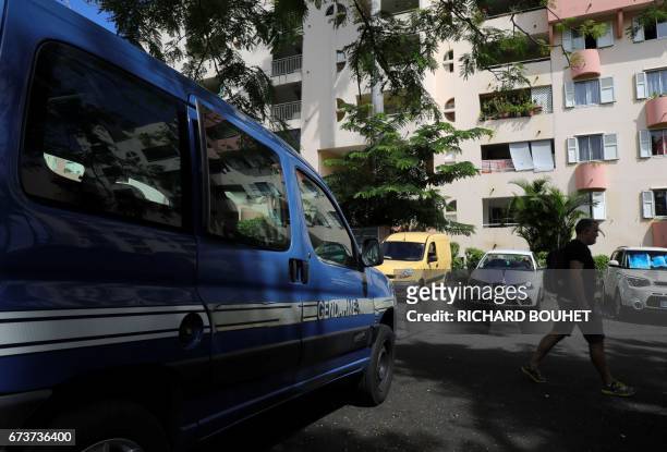 French gendarme vehicle stands in front of a building on April 27, 2017 in Saint-Denis-de-la-Reunion, on the French Indian Ocean island of Reunion,...