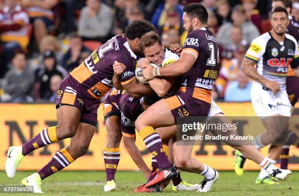 Matt Moylan of the Panthers is wrapped up by the defence during the round nine NRL match between the Brisbane Broncos and the Penrith Panthers at...