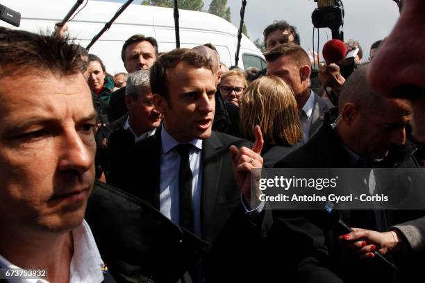 President of the political movement 'En Marche" and French presidential election candidate Emmanuel Macron meets strike employees of Whirlpool on...