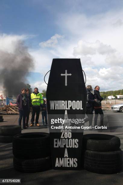 President of the political movement 'En Marche" and French presidential election candidate Emmanuel Macron meets strike employees of Whirlpool on...