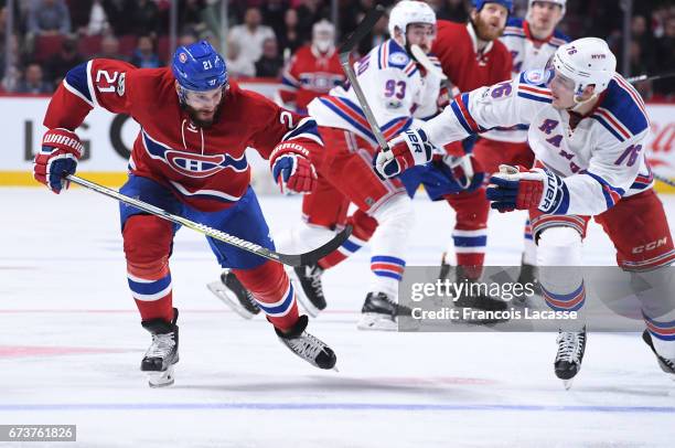 Dwight King of the Montreal Canadiens skates against Brady Skjei of the New York Rangers in Game Five of the Eastern Conference Quarterfinals during...